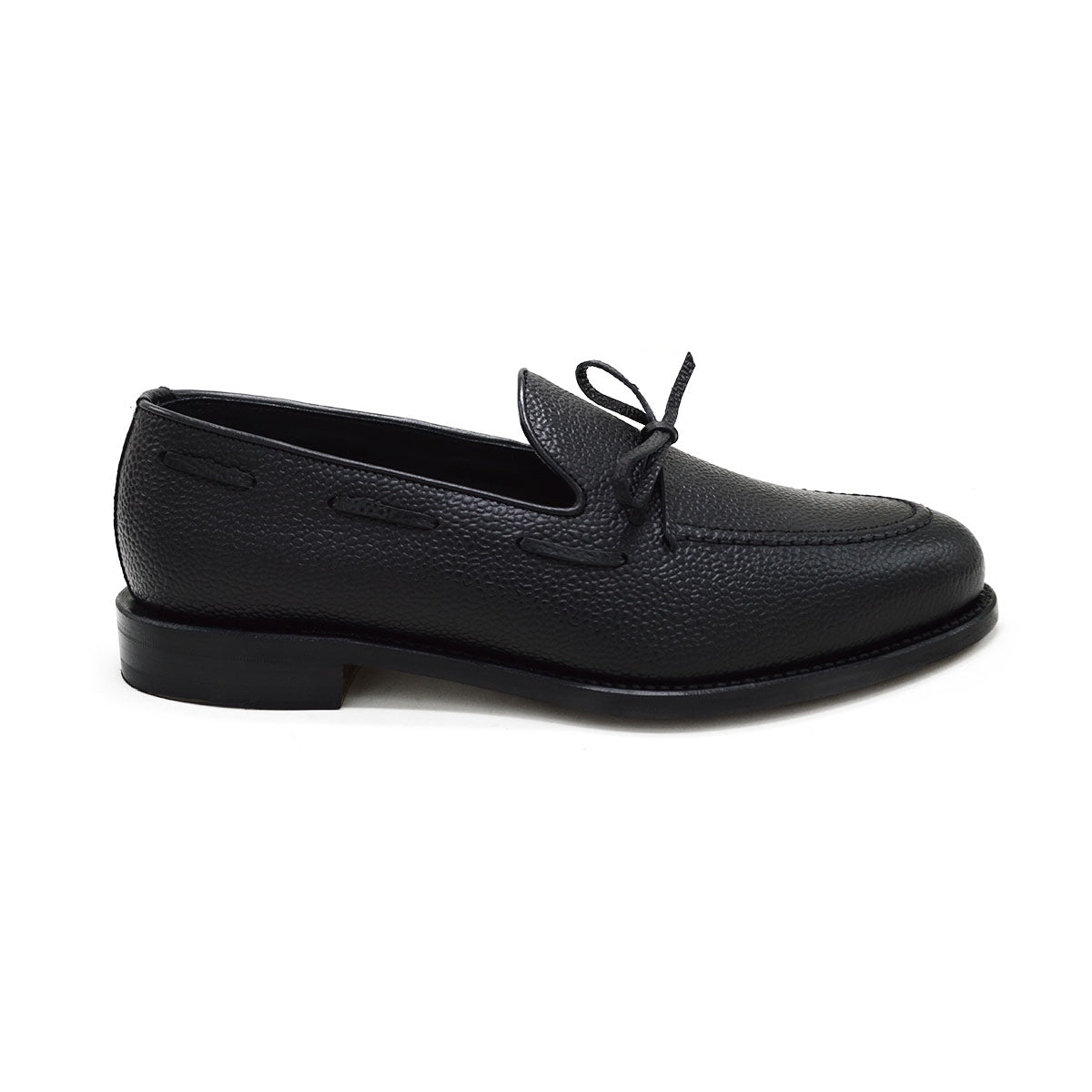 A Berwick 1707 classic black unlined laced slip-on loafer with a Goodyear welted leather sole.