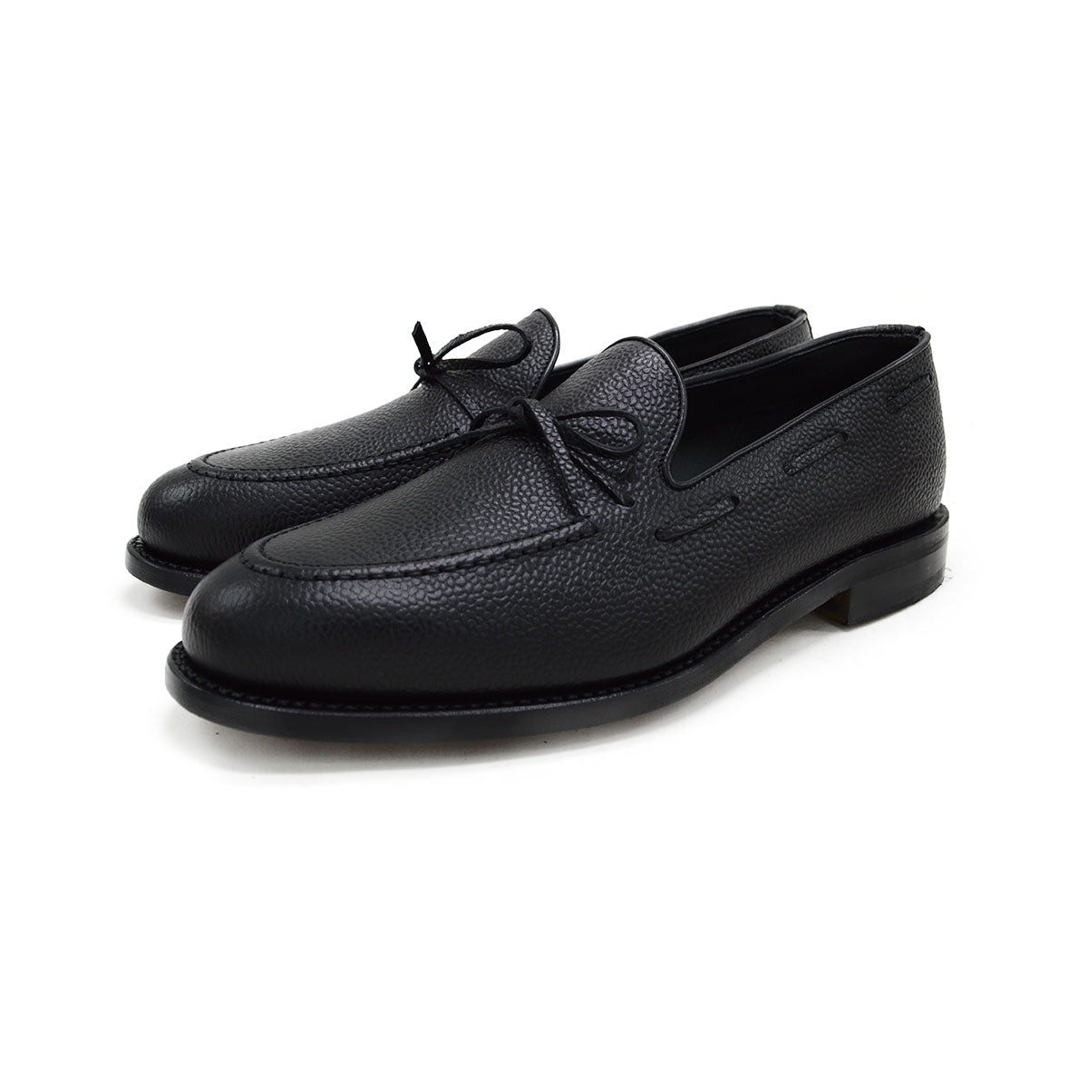 A Berwick 1707 classic black unlined laced slip-on loafer with a Goodyear welted leather sole.