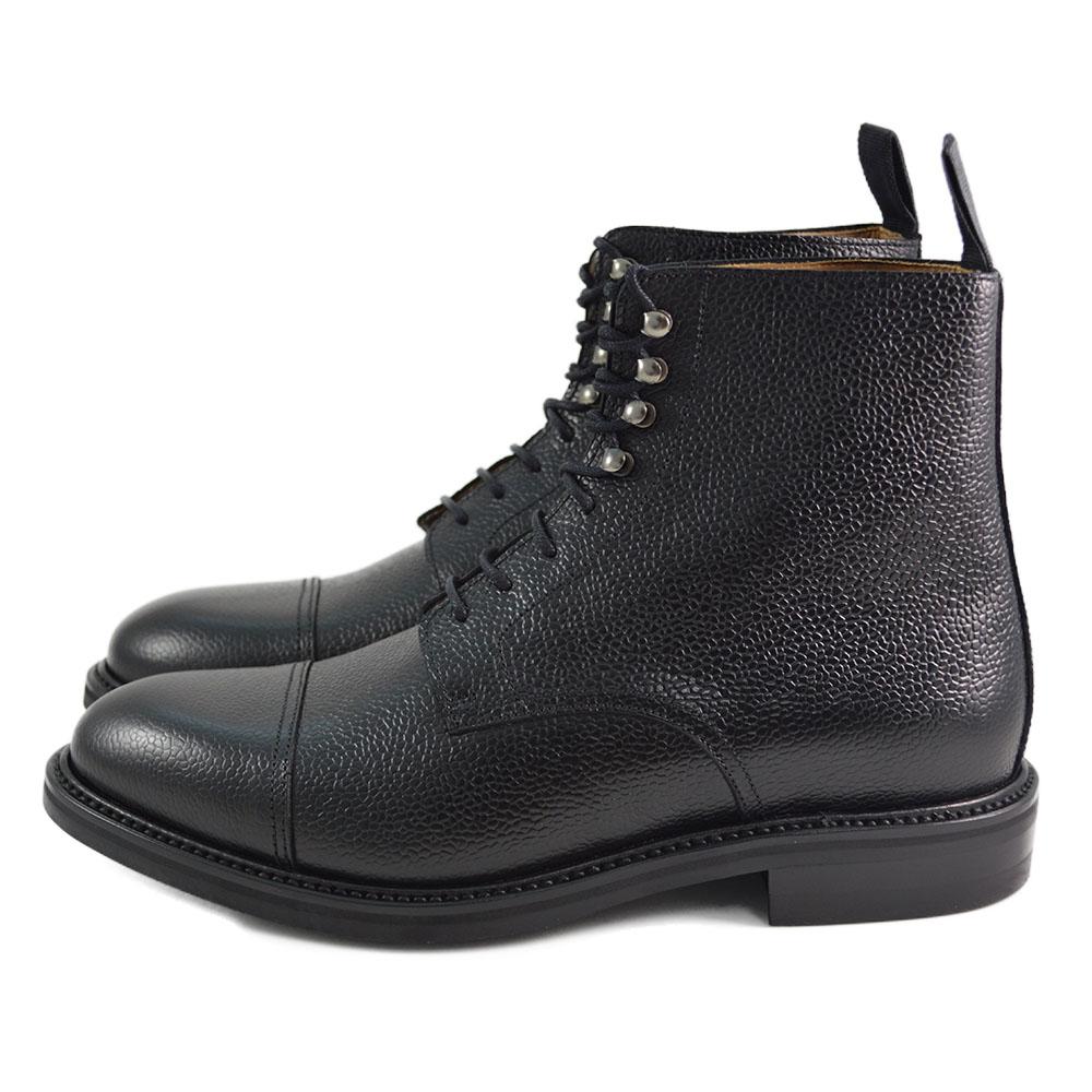 A Berwick 1707 black grain toe cap boot with a full lace-up construction and a round toe shape, set against a white background.