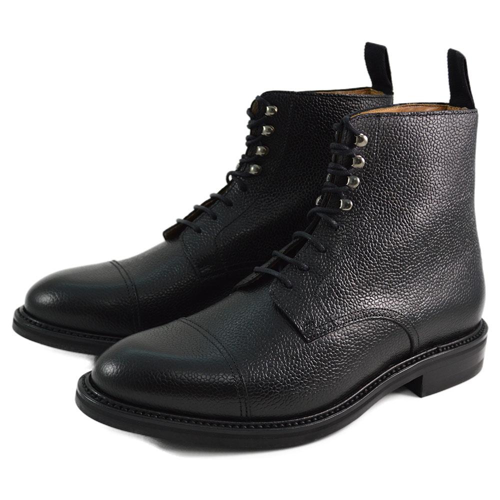 A Berwick 1707 black grain toe cap boot with a full lace-up construction and a round toe shape, set against a white background.