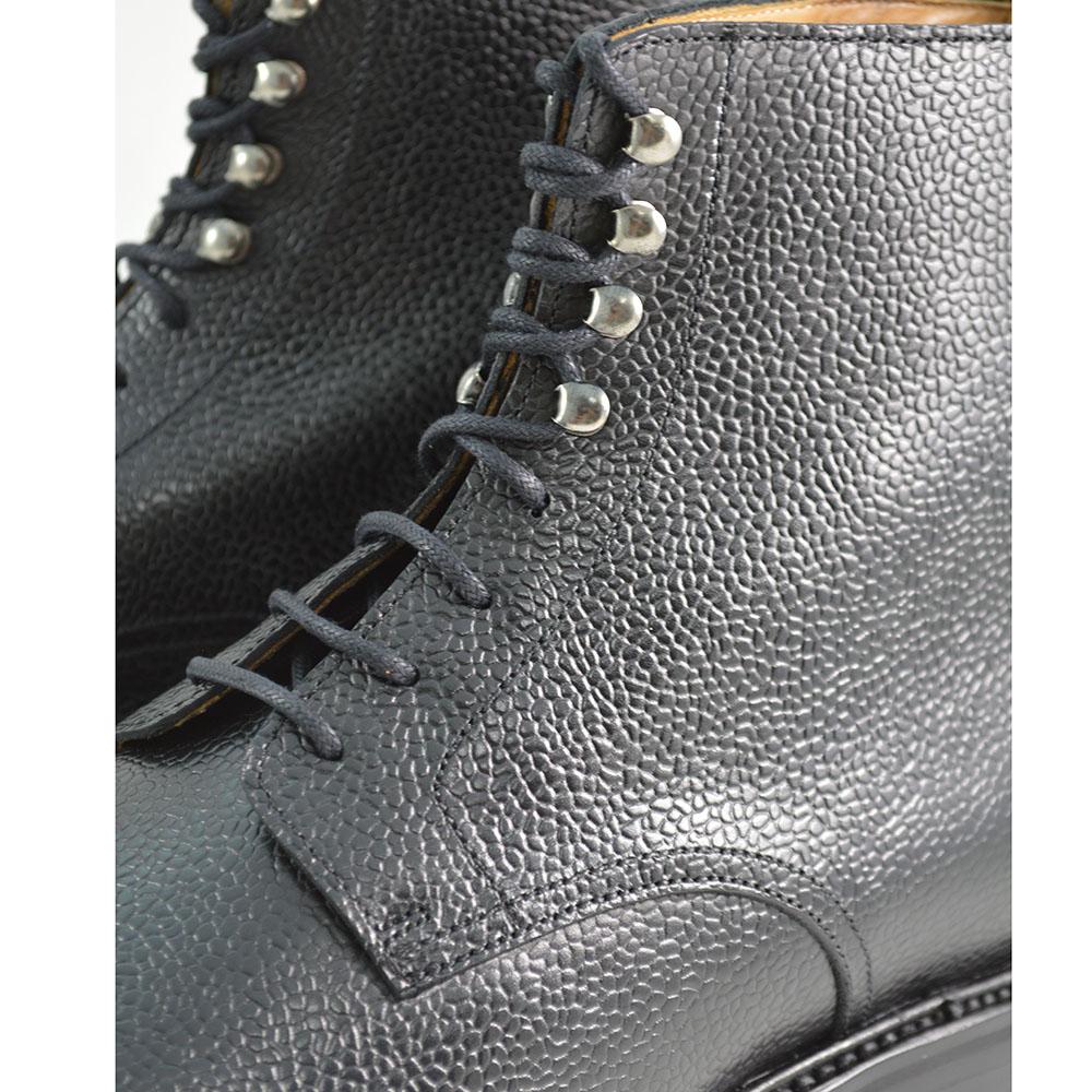 A Berwick 1707 black grain toe cap boot with a full lace-up construction and a round toe shape, set against a white background.