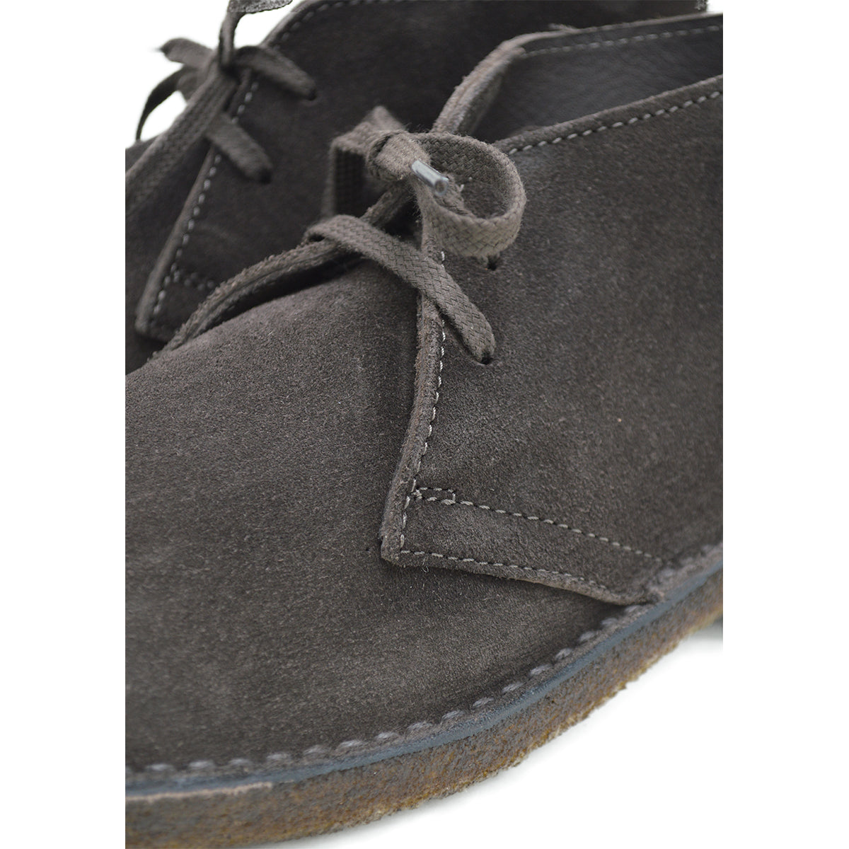 A brown Astorflex Montflex unlined boot with a lace-up closure, made from reverse suede, showcasing the natural rubber sole.