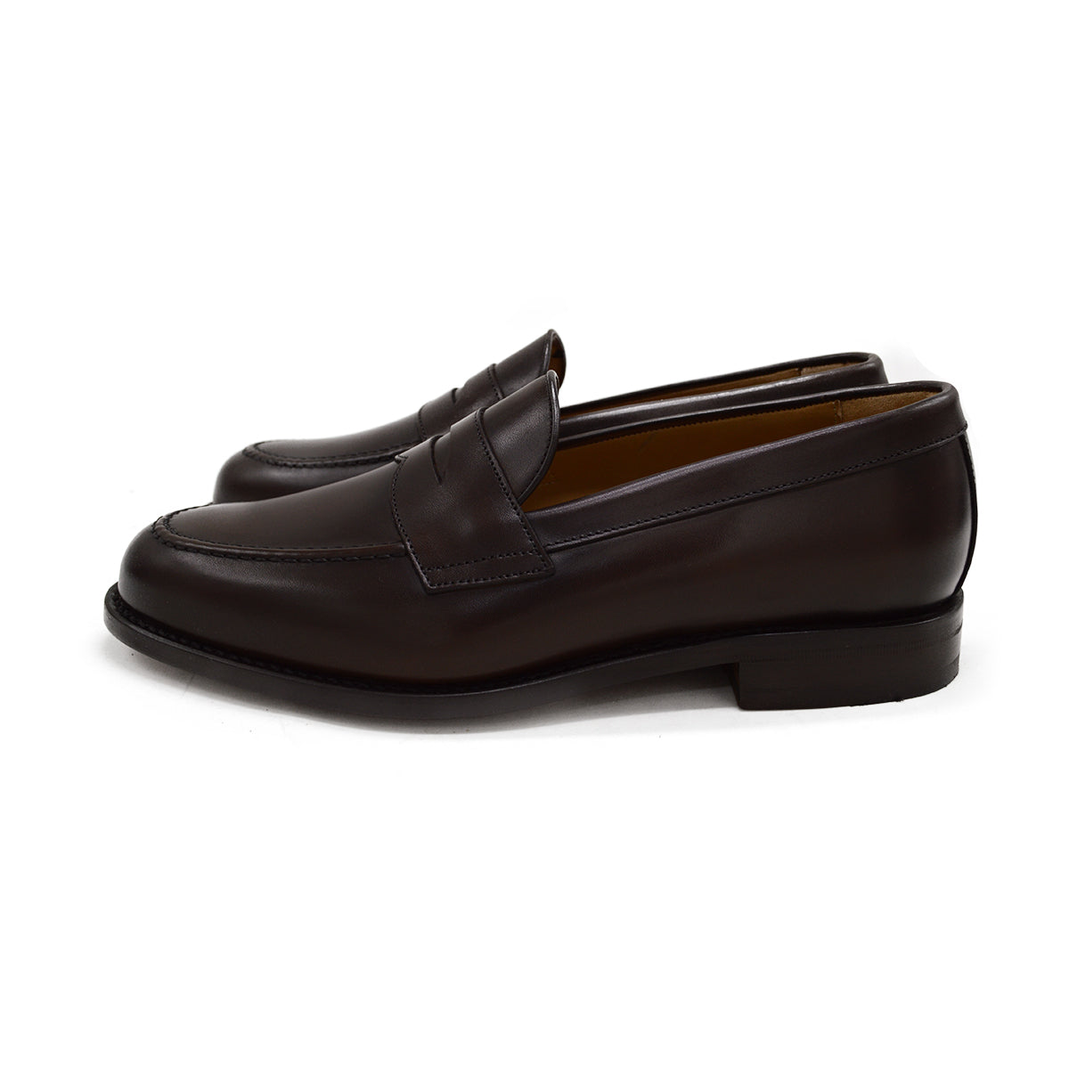 A dark brown Berwick 1707 Penny Loafer with a closed toe and loafers style heel, displayed on a white background.