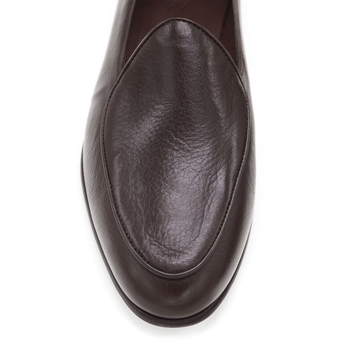 A dark brown deerskin leather Belgian loafer with an almond toe shape and minimal stitching.
