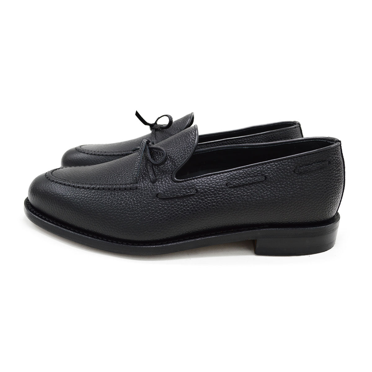 A Berwick 1707 classic black unlined laced slip-on loafer with a Goodyear welted leather sole.