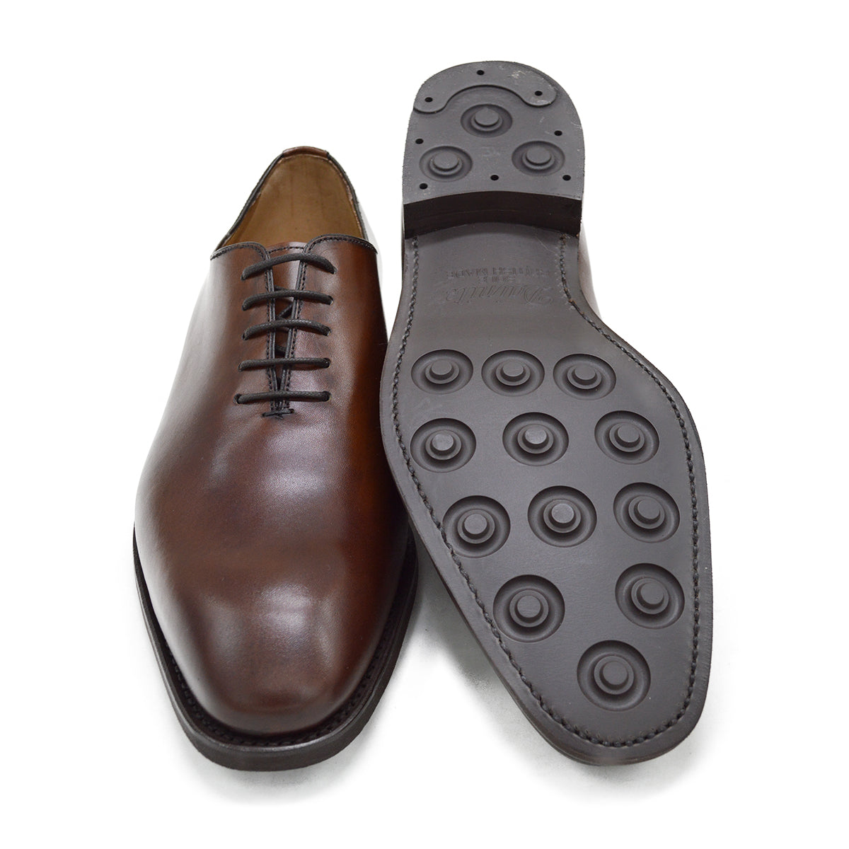 A Berwick 1707 brown leather wholecut oxford shoe with a lace-up closure and a round toe.