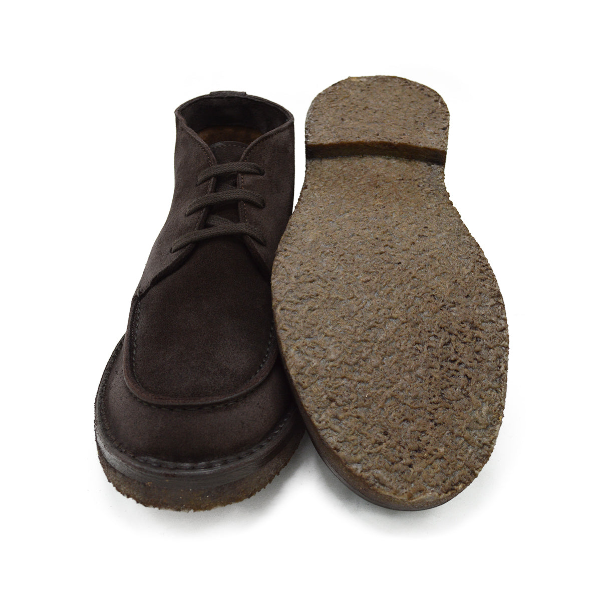 A brown Berwick 1707 apron boot with lace-up closure, handcrafted from reverse kudu suede, featuring moccasin stitching and a crepe rubber sole.