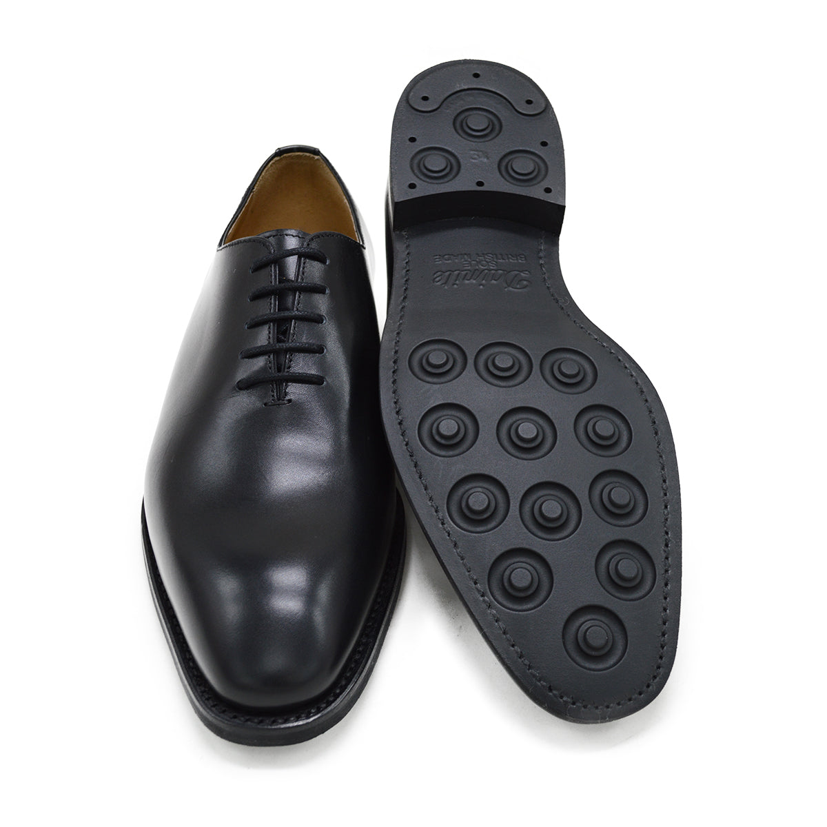 A black Berwick 1707 Wholecut Oxford shoe made from box calf leather with a lace-up closure and a round toe.