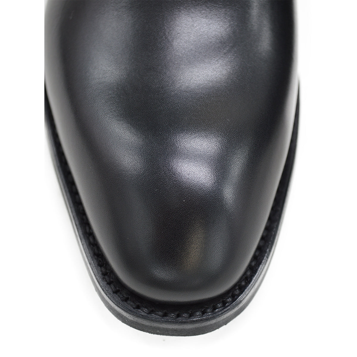 A black Berwick 1707 Wholecut Oxford shoe made from box calf leather with a lace-up closure and a round toe.