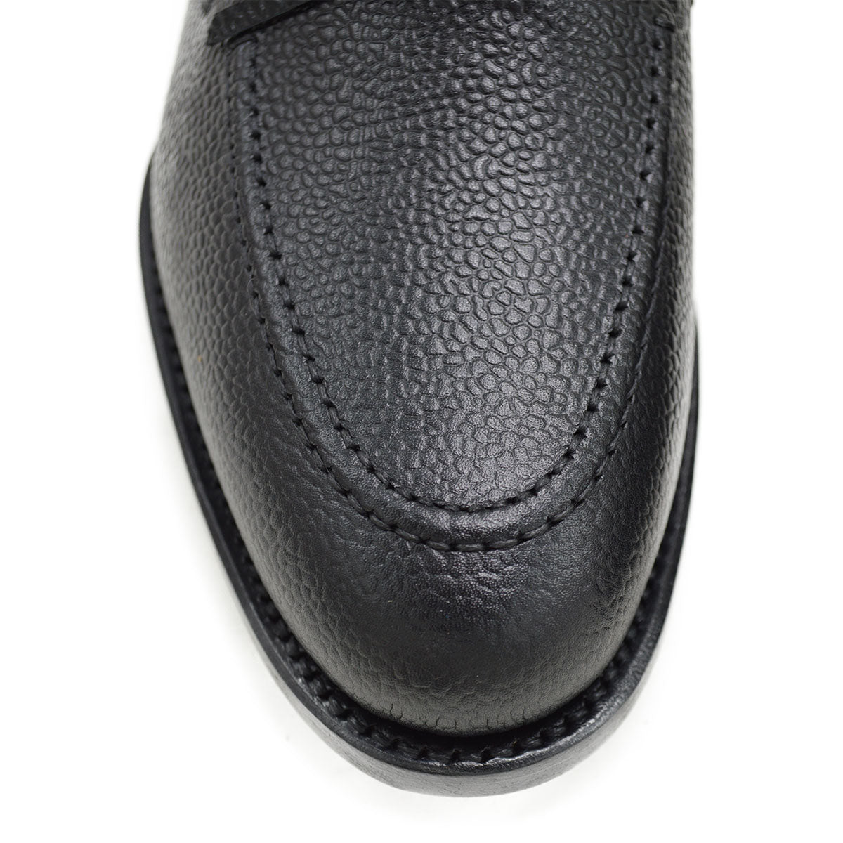 A Berwick 1707 classic black unlined laced slip-on loafer with a Goodyear welted leather sole.