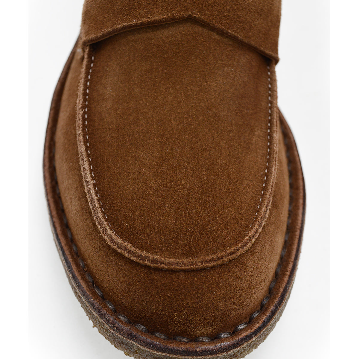 A brown Astorflex Sadelflex Loafer with soft suede upper and crepe rubber sole