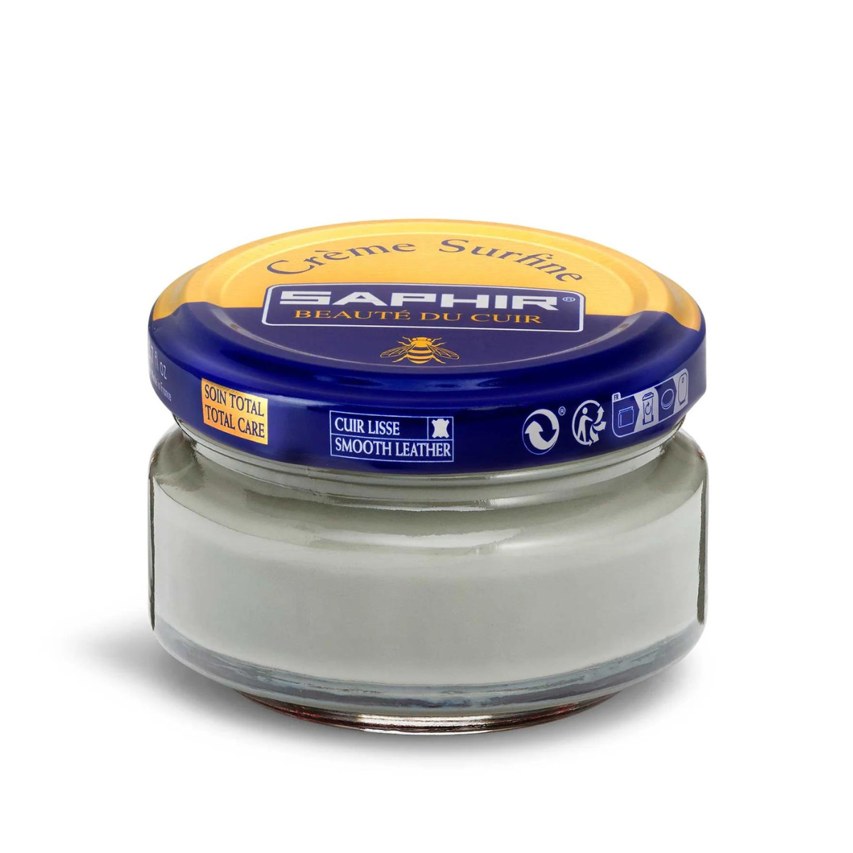 A jar of Saphir Creme Surfine shoe polish with a label on the lid.