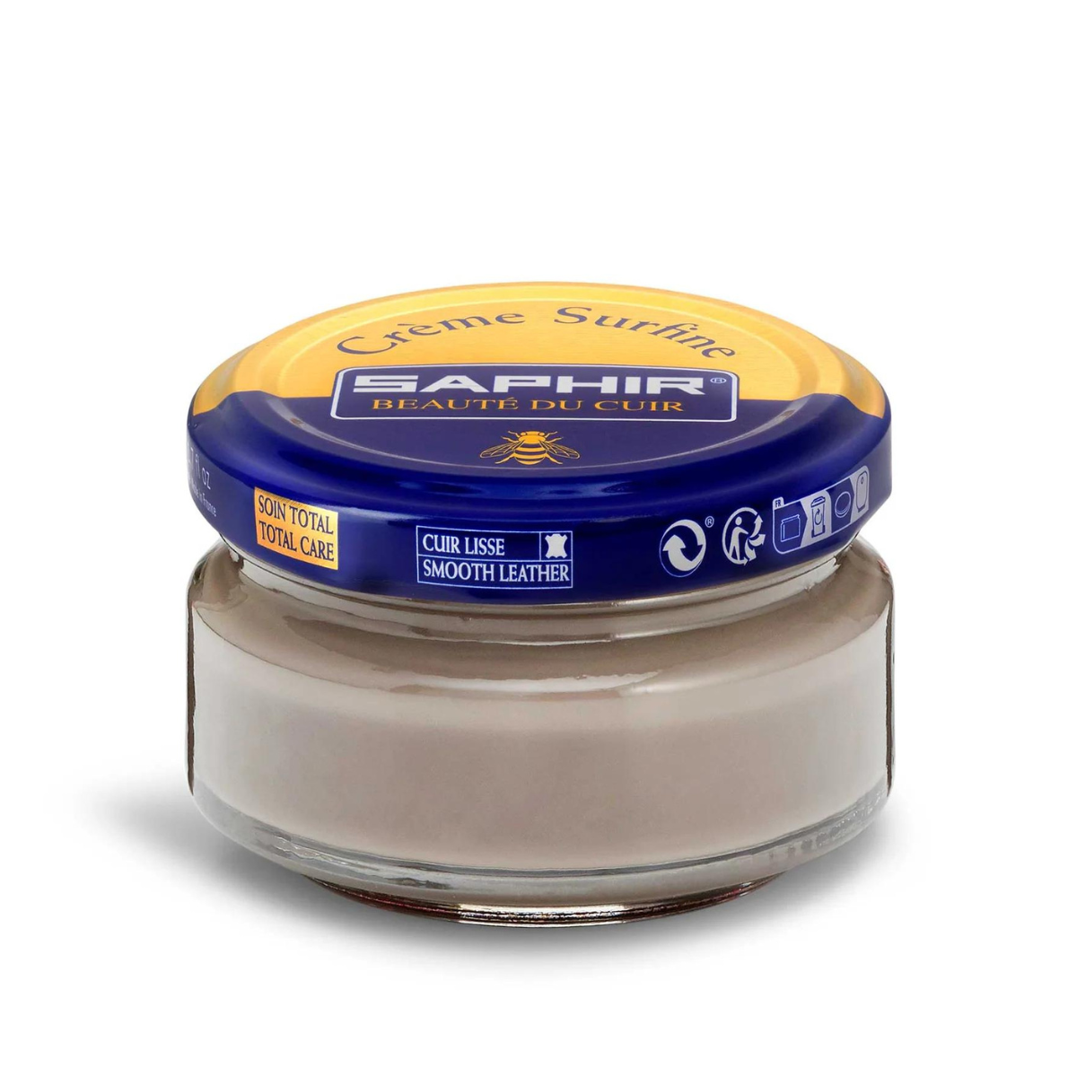 A jar of Saphir Creme Surfine shoe polish with a label on the lid.