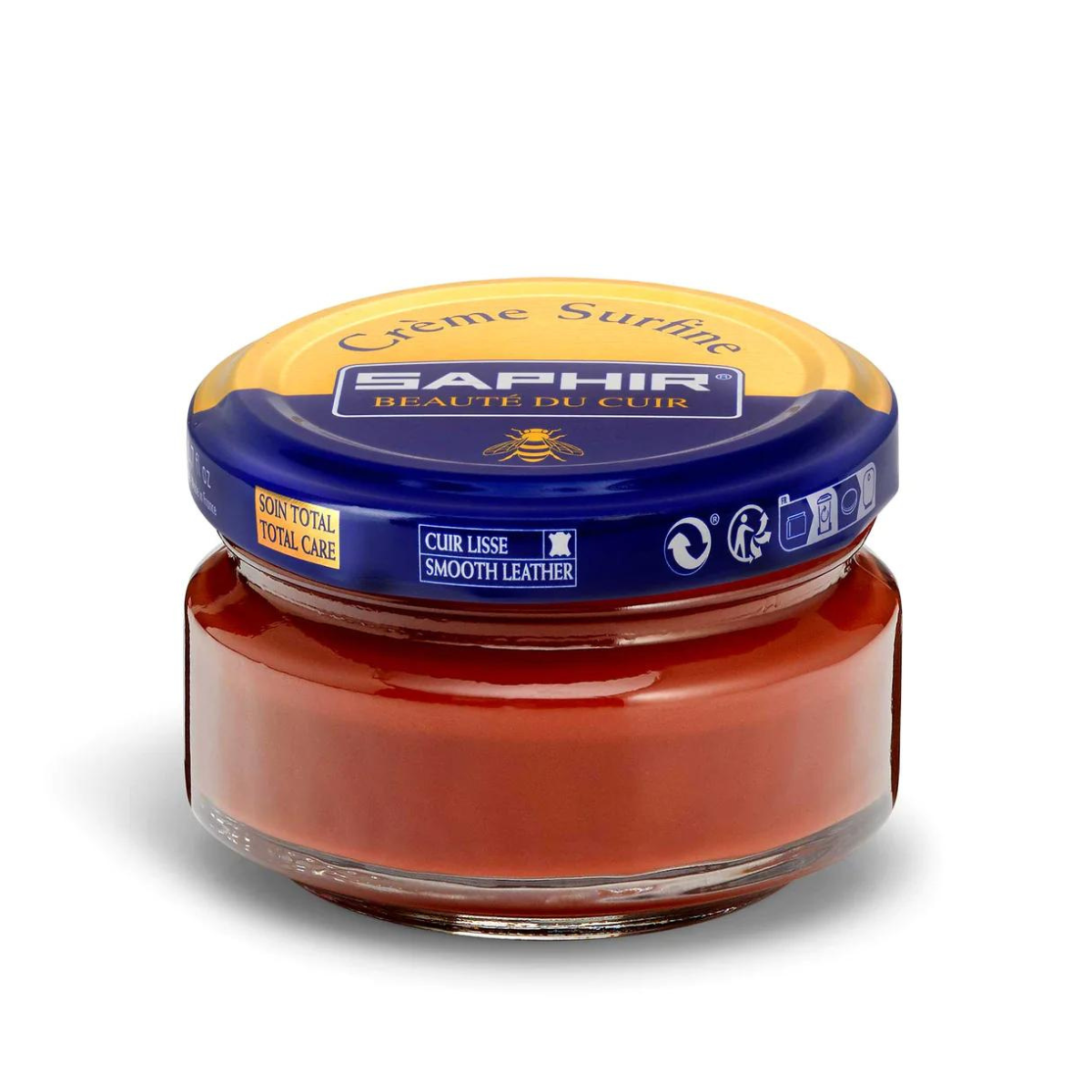 A jar of Saphir Creme Surfine shoe polish with a label on the lid.