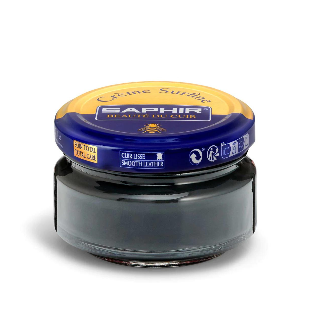 A jar of Saphir Creme Surfine shoe polish with a label on the lid.