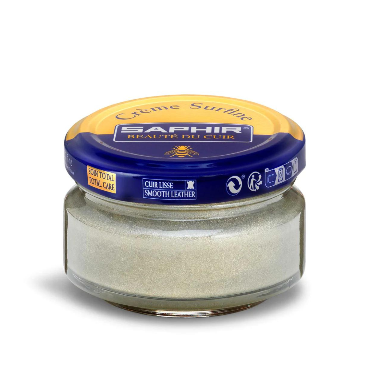 A jar of Saphir Creme Surfine shoe polish with a label on the lid.