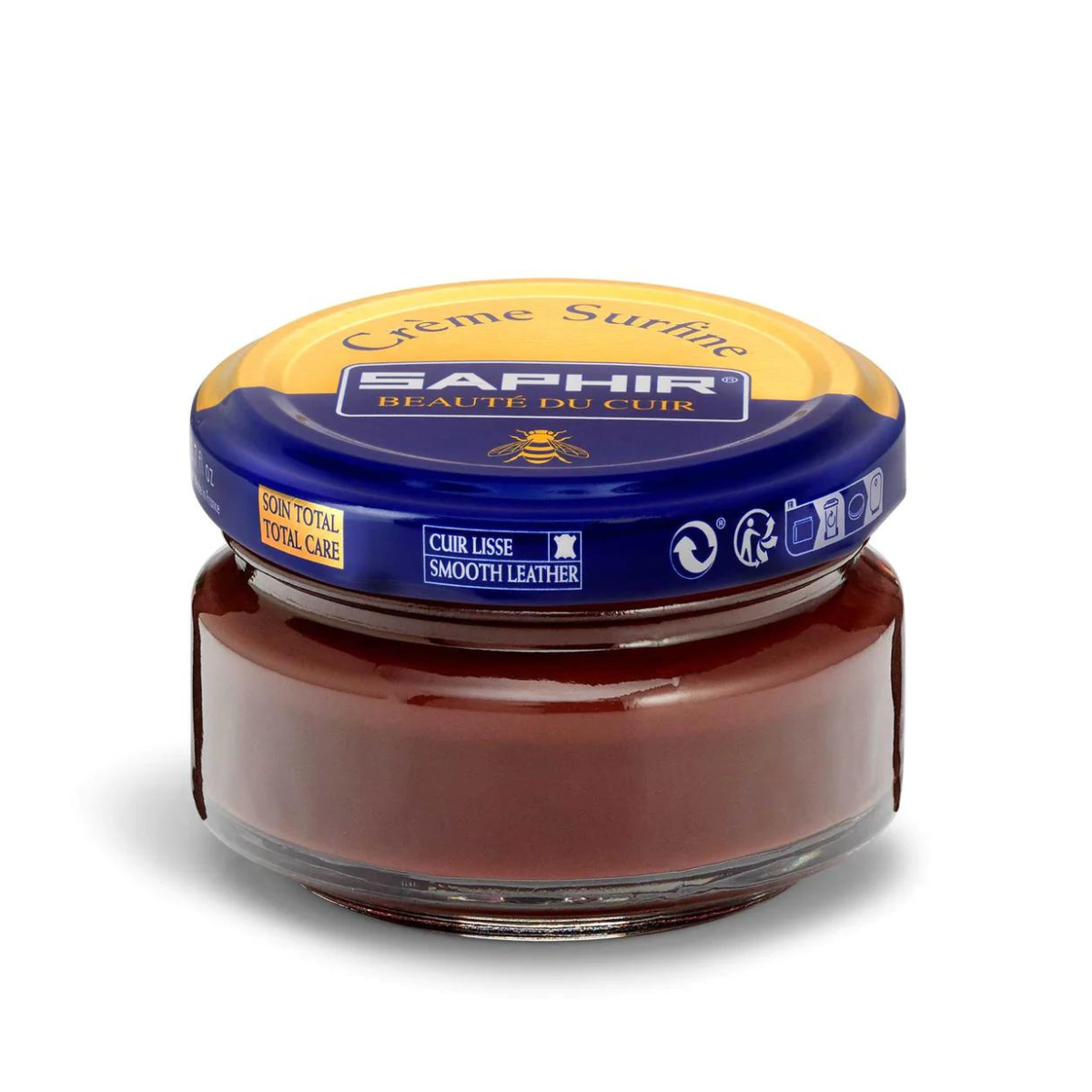 A jar of Saphir Creme Surfine shoe polish with a label on the lid.