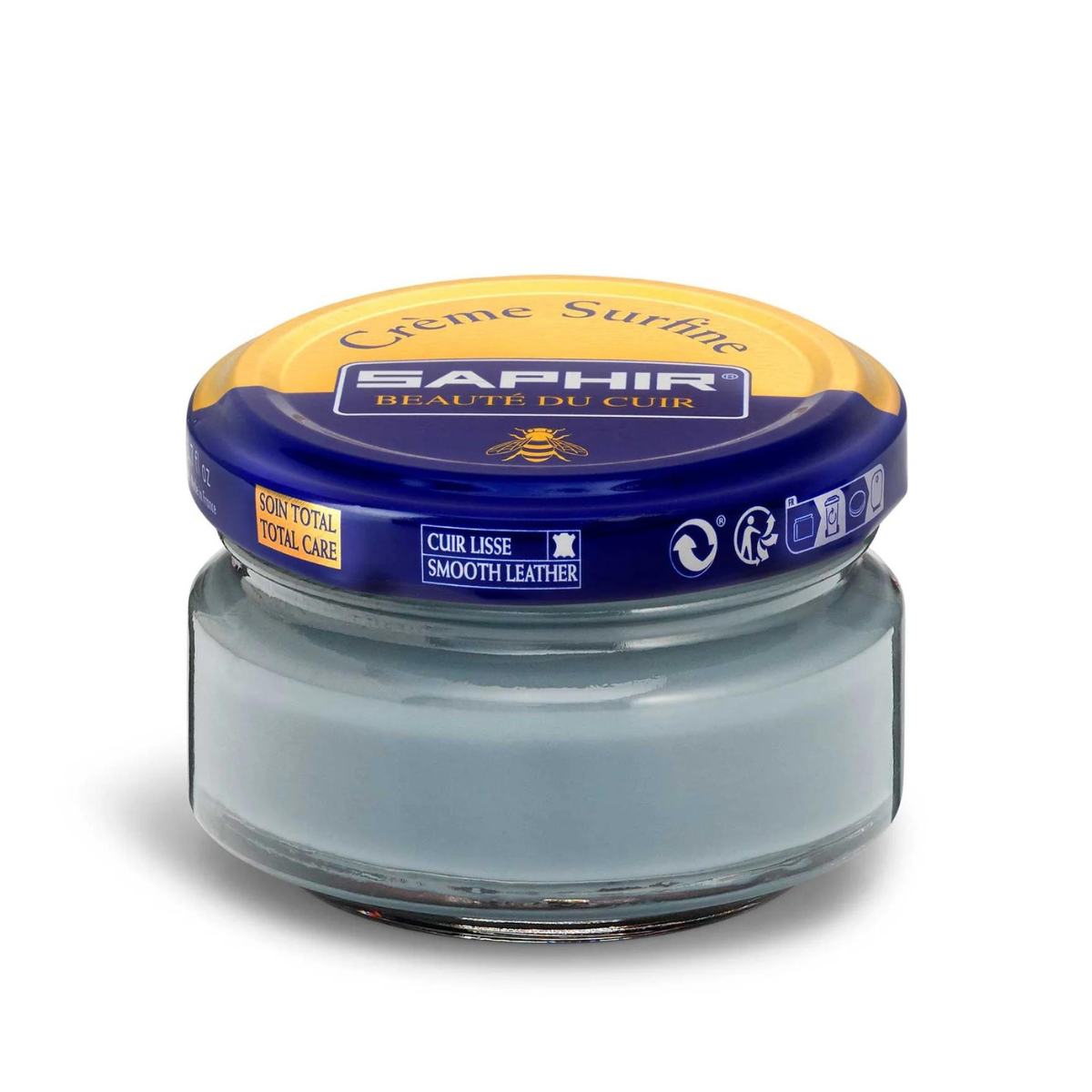 A jar of Saphir Creme Surfine shoe polish with a label on the lid.