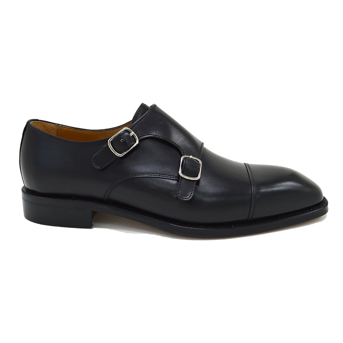 A Berwick 1707 lack double monk shoe with two buckle straps, made from calf leather and featuring a Goodyear welted leather sole.