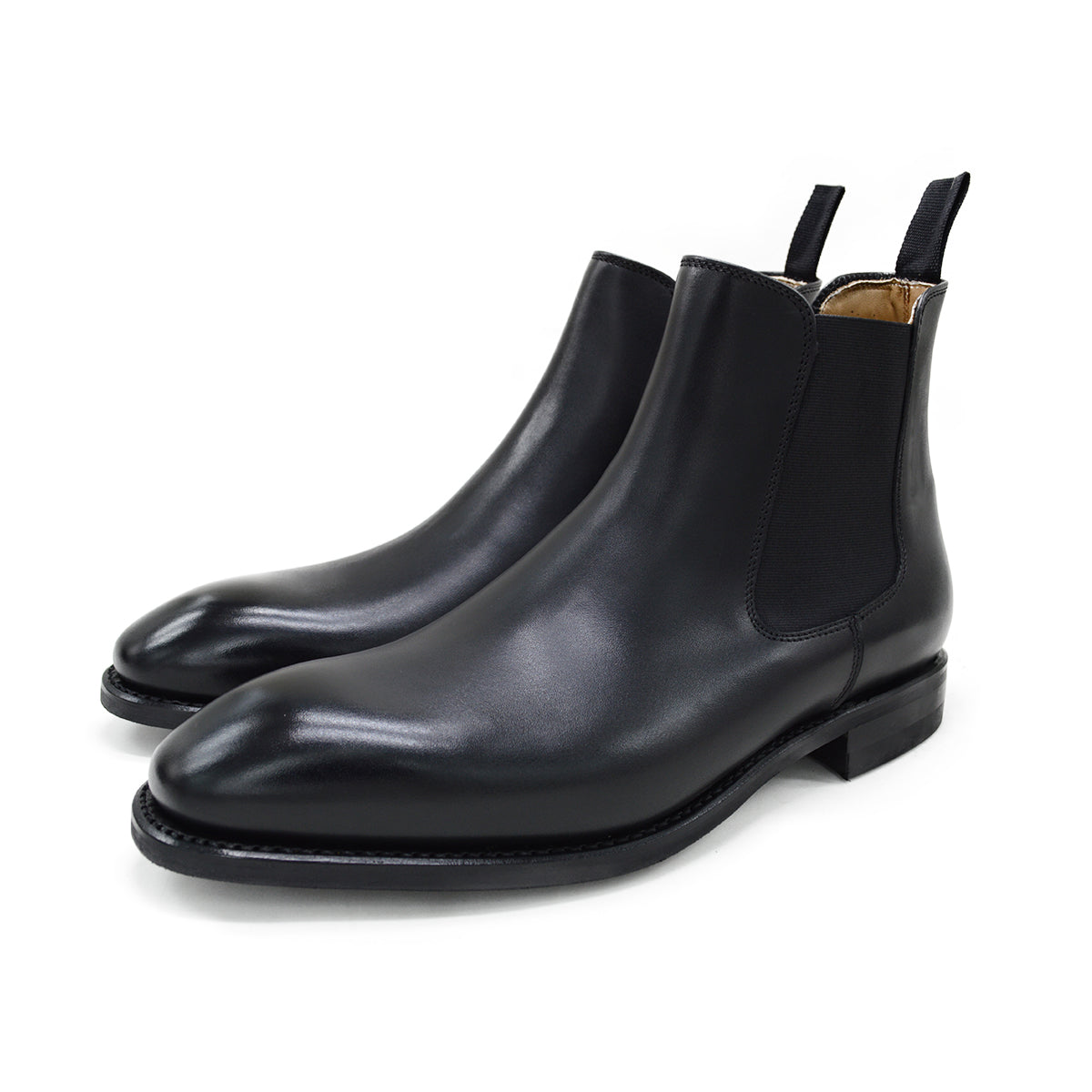 A Berwick 1707 black leather Chelsea boot with a side elastic panel and a low heel, displayed on a white background.