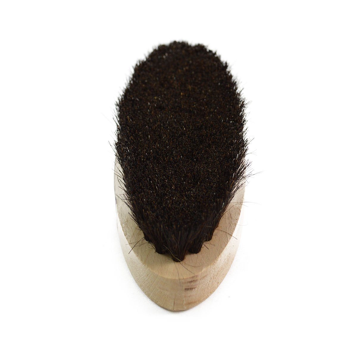 An oval shoe shine brush with horsehair bristles, with natural black bristles, wooden handle, on a white background.