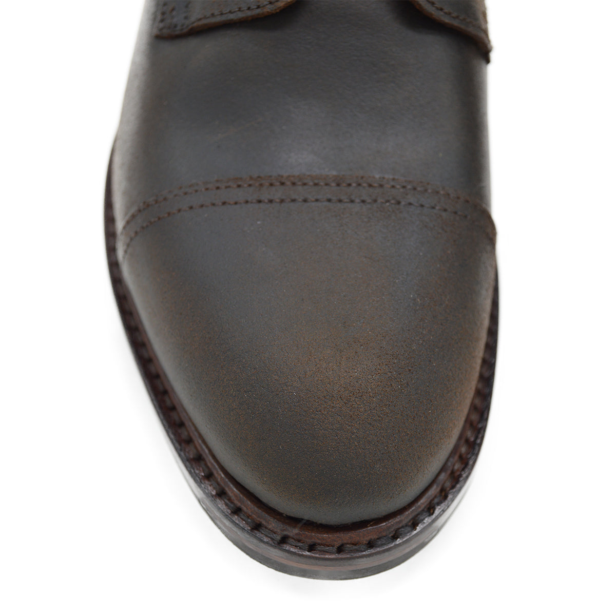 A Berwick 1707 dark brown, waxed roughout suede classic country toe cap derby boot with Dainite rubber sole and lace-up closure.