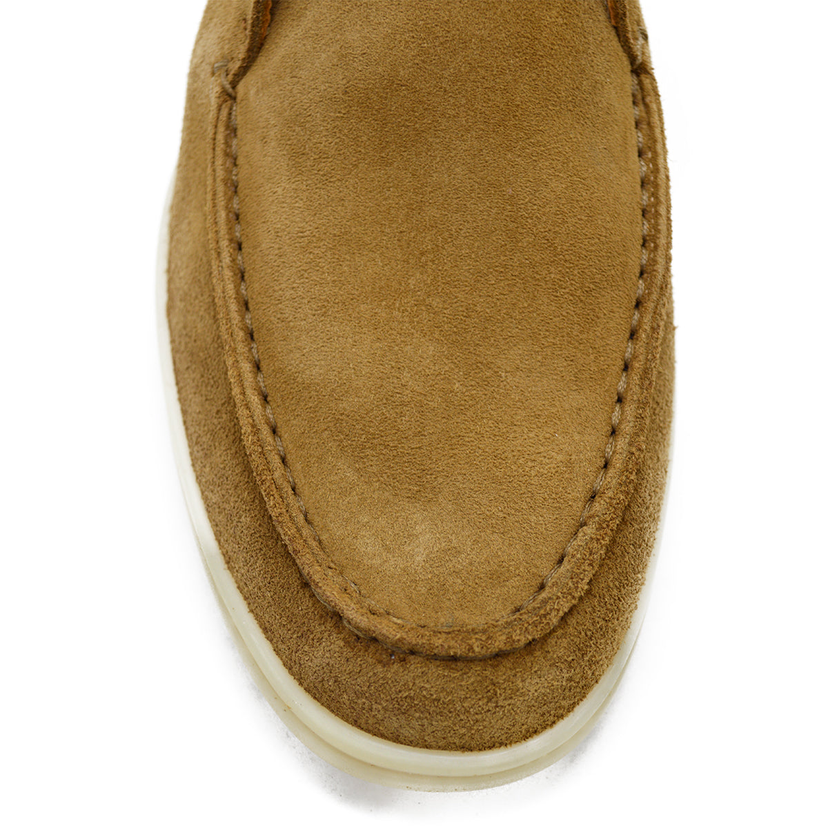 A brown ankle boot made of reverse kudu suede, featuring a low heel and a smooth texture.