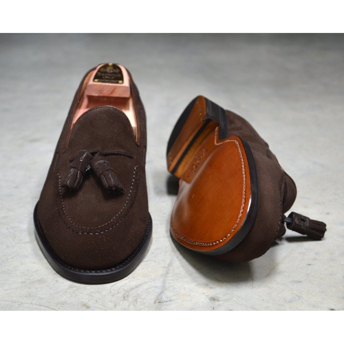A classic dark brown suede slip-on shoe with tassels, by Berwick 1707.