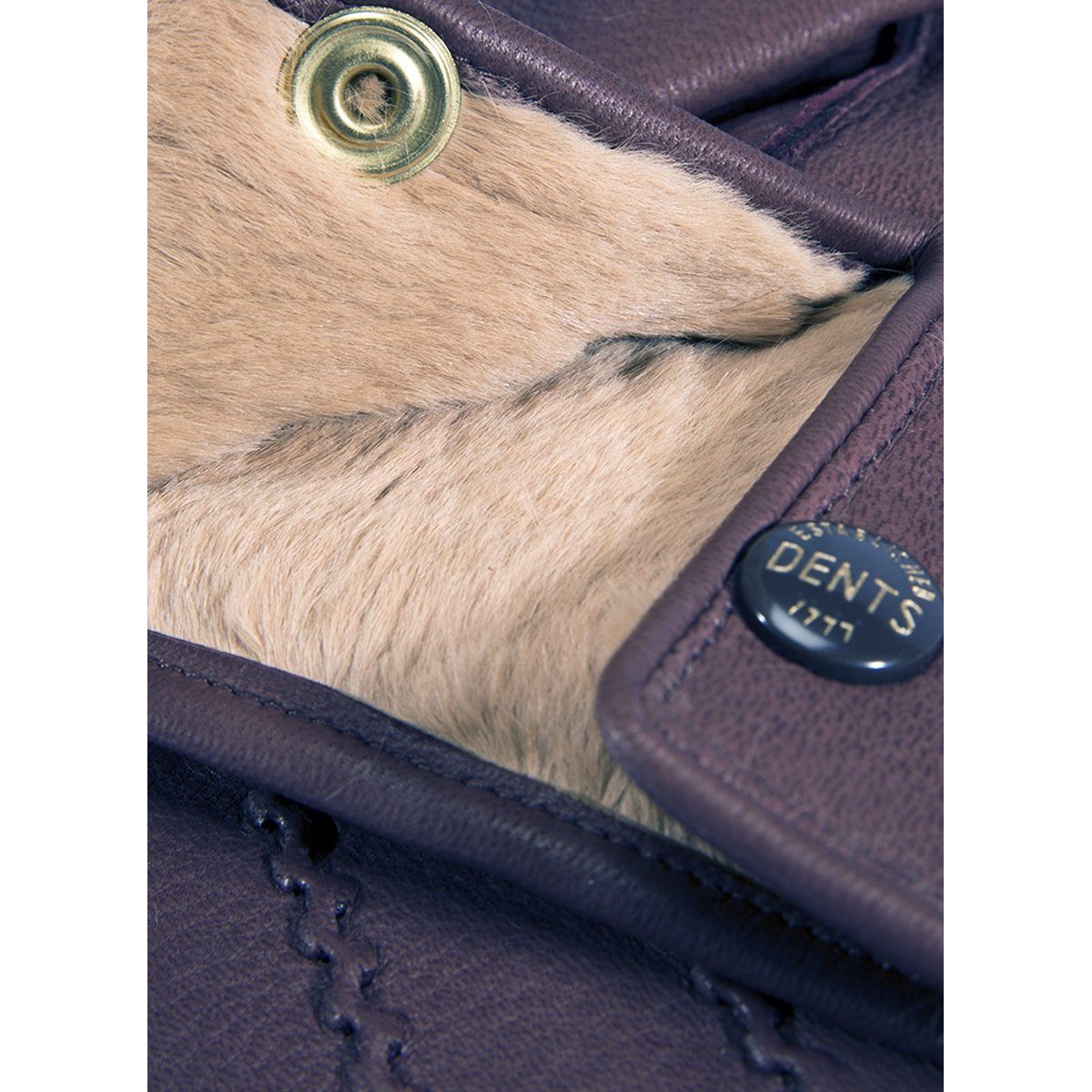 A pair of bark deerskin leather gloves with rabbit fur lining, featuring three points and Dents stud closure.