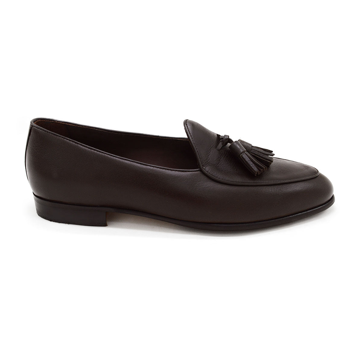 A Berwick 1707 dark brown deerskin Belgian loafer with a tassel detail on the vamp, displayed on a white background.
