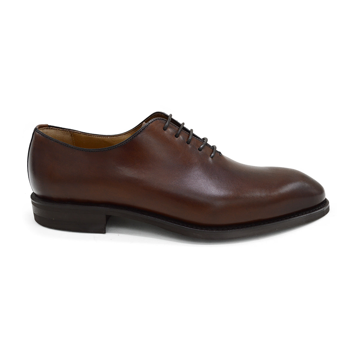 A Berwick 1707 brown leather wholecut oxford shoe with a lace-up closure and a round toe.