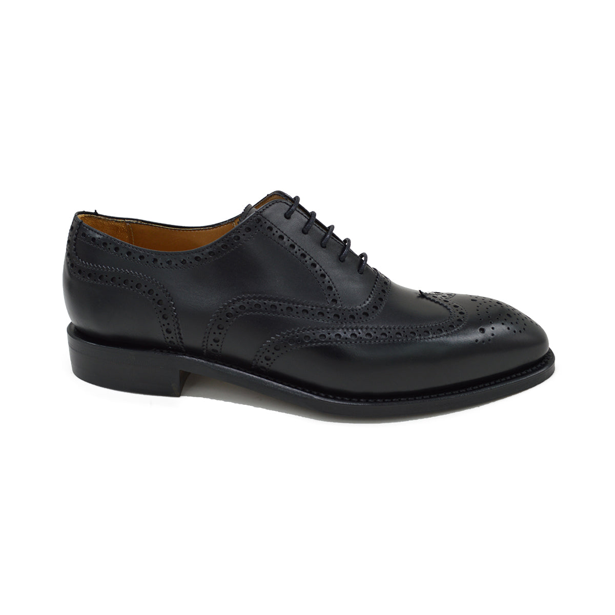 A Berwick 1707 black Oxford brogue shoe with brogue detailing and a lace-up closure. The shoe is made of smooth leather and appears to be sturdy and durable.
