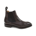 A dark brown leather Chelsea boot with a side pull tab and a low heel, displayed on a white background.