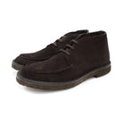 A brown Berwick 1707 apron boot with lace-up closure, handcrafted from reverse kudu suede, featuring moccasin stitching and a crepe rubber sole.