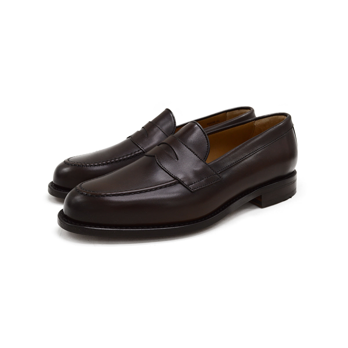 A dark brown Berwick 1707 Penny Loafer with a closed toe and loafers style heel, displayed on a white background.