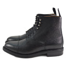 A Berwick 1707 black grain toe cap boot with a full lace-up construction and a round toe shape, set against a white background.