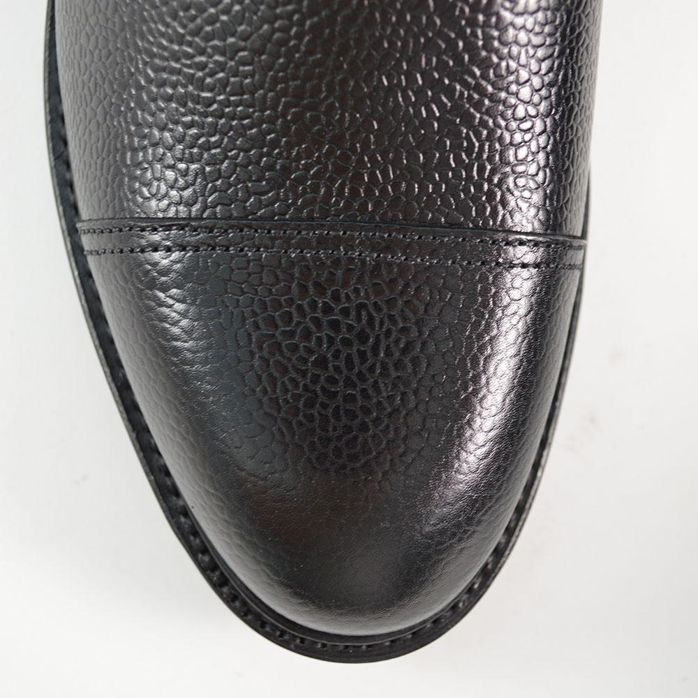 A Berwick 1707 black grain toe cap boot with a full lace-up construction and a round toe shape, set against a white background.