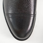 A Berwick 1707 black grain toe cap boot with a full lace-up construction and a round toe shape, set against a white background.
