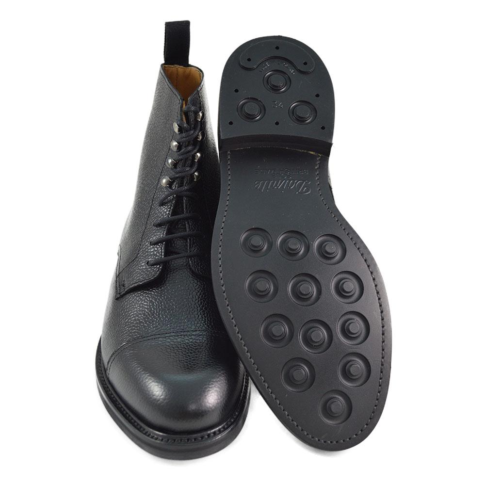 A Berwick 1707 black grain toe cap boot with a full lace-up construction and a round toe shape, set against a white background.
