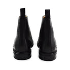 A Berwick 1707 black grain toe cap boot with a full lace-up construction and a round toe shape, set against a white background.