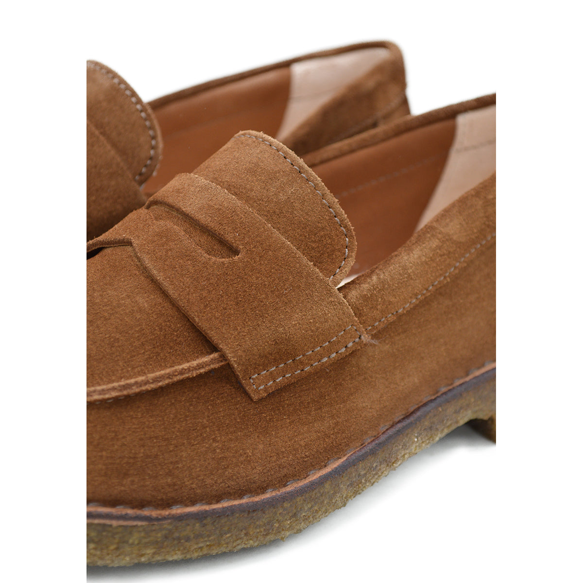 A brown Astorflex Sadelflex Loafer with soft suede upper and crepe rubber sole