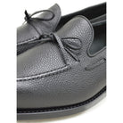 A Berwick 1707 classic black unlined laced slip-on loafer with a Goodyear welted leather sole.
