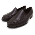 A dark brown deerskin leather Belgian loafer with an almond toe shape and minimal stitching.