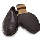 A dark brown deerskin leather Belgian loafer with an almond toe shape and minimal stitching.