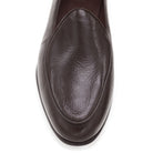 A dark brown deerskin leather Belgian loafer with an almond toe shape and minimal stitching.