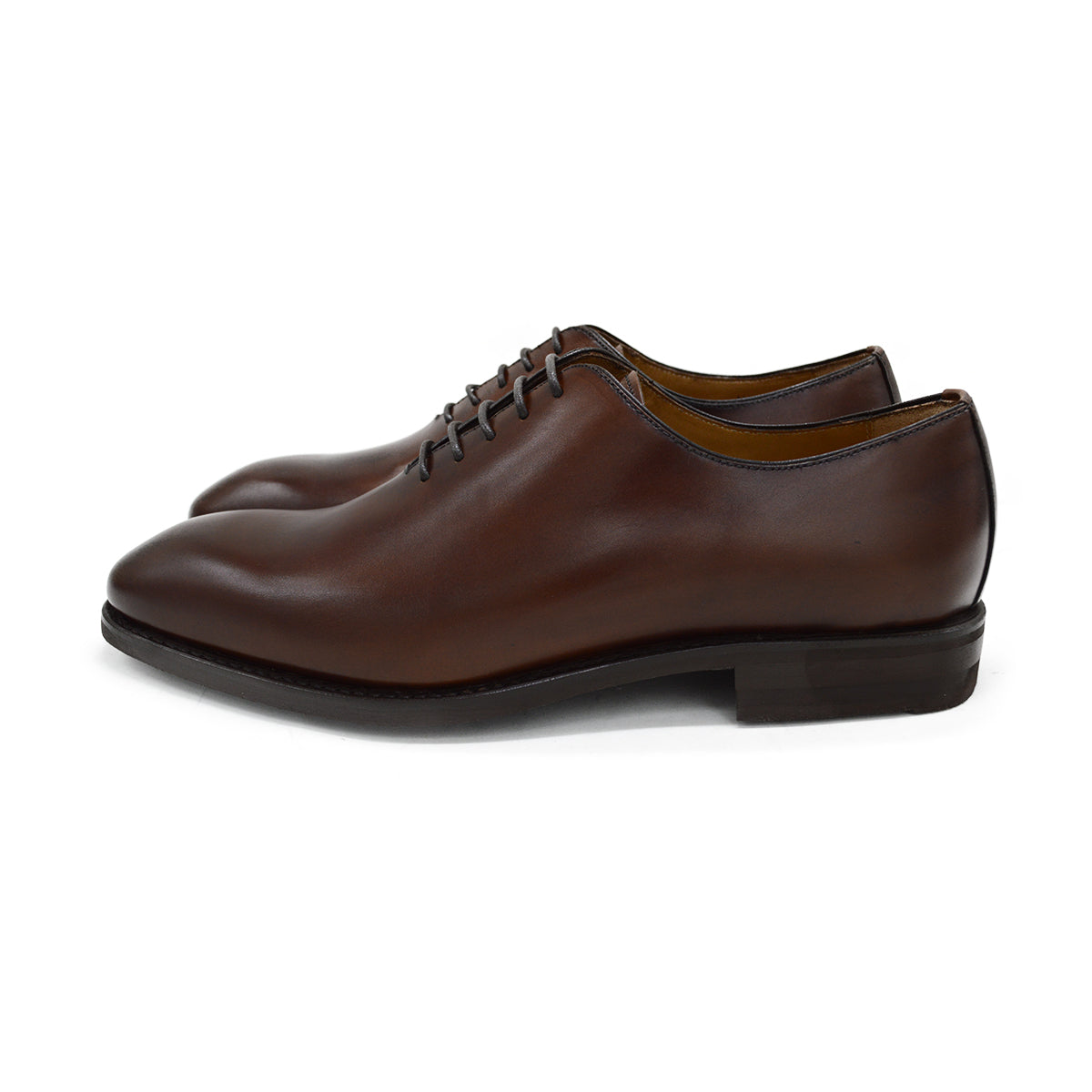A Berwick 1707 brown leather wholecut oxford shoe with a lace-up closure and a round toe.
