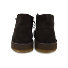 A brown Astorflex Montflex unlined boot with a lace-up closure, made from reverse suede, showcasing the natural rubber sole.