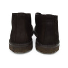 A brown Berwick 1707 apron boot with lace-up closure, handcrafted from reverse kudu suede, featuring moccasin stitching and a crepe rubber sole.