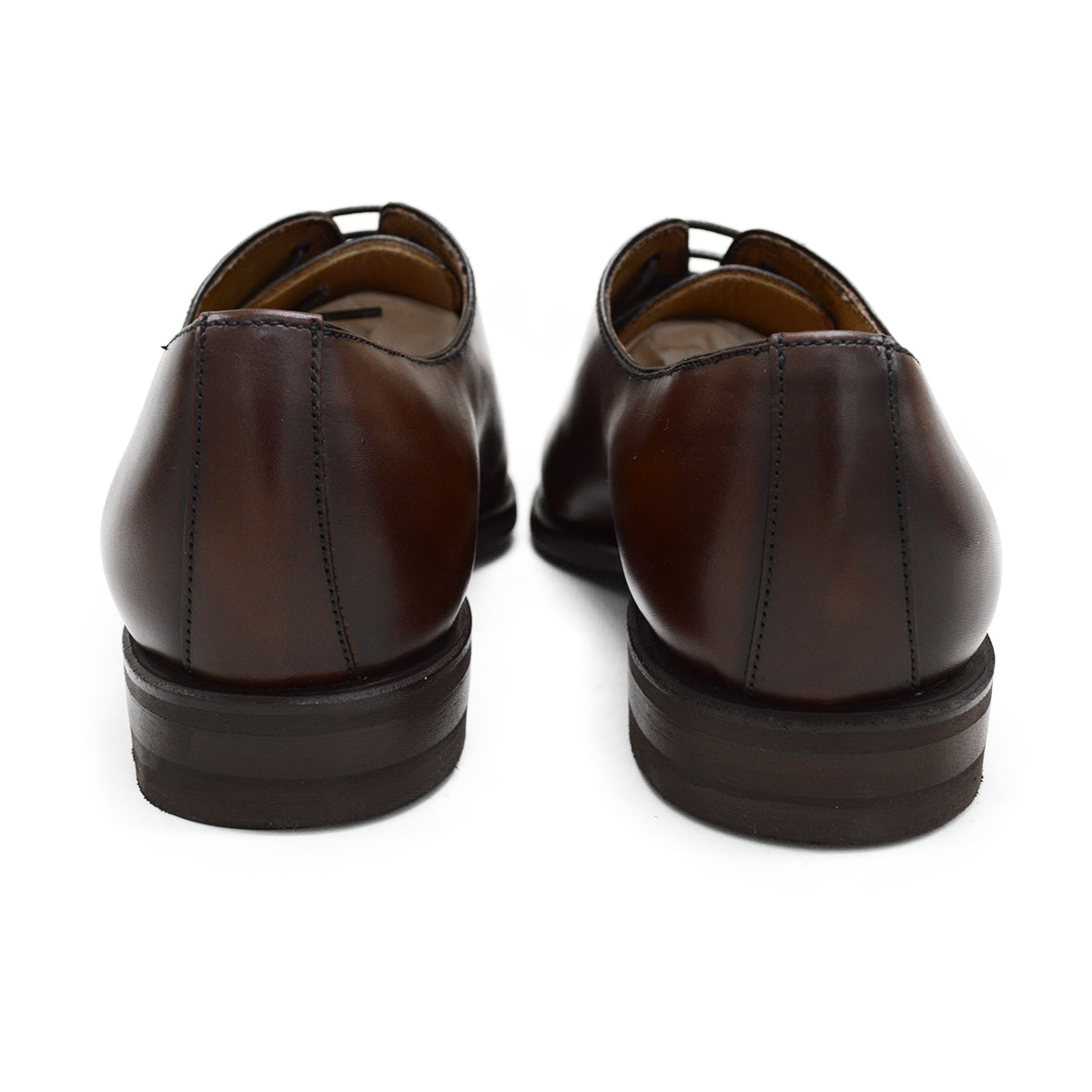 A Berwick 1707 brown leather wholecut oxford shoe with a lace-up closure and a round toe.