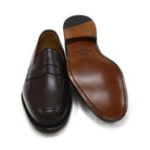 A dark brown Berwick 1707 Penny Loafer with a closed toe and loafers style heel, displayed on a white background.